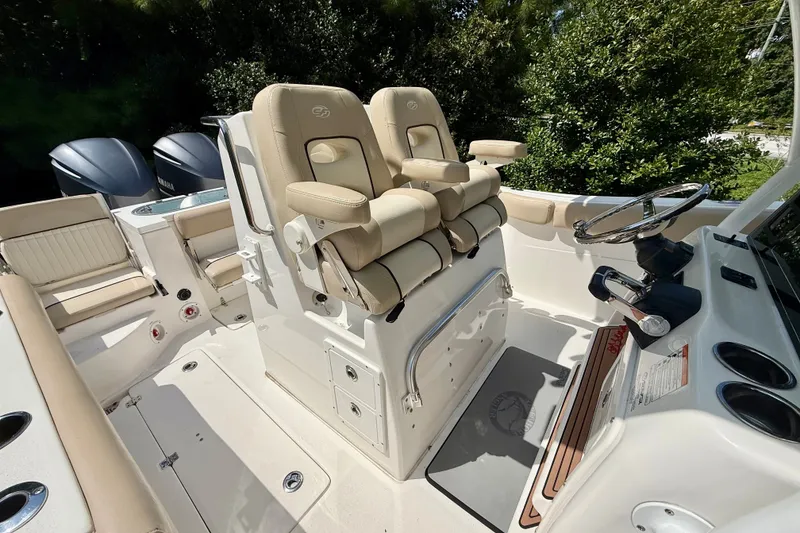 Slide: The Image of 2017 Sea Fox 288 Commander boat interior with dual helm seats and steering console. - 19