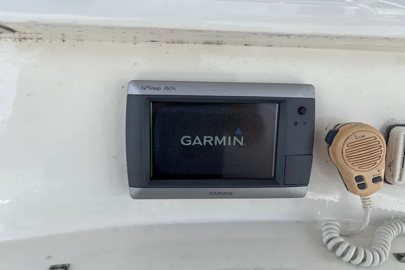 Slide: The Image of Garmin GPSmap 740s and Icom radio on 2006 Boston Whaler Outrage 270 boat. - 24