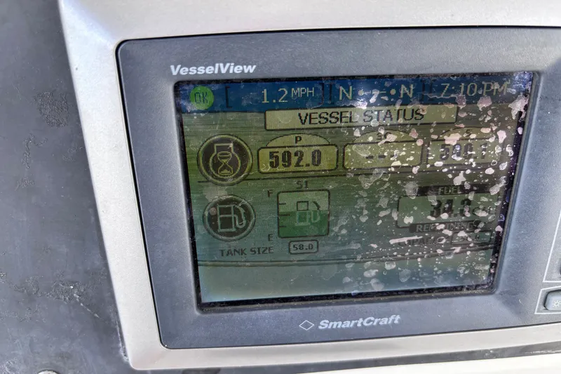 Slide: The Image of Close-up of a 2006 Boston Whaler Outrage 270 VesselView display showing vessel status. - 18