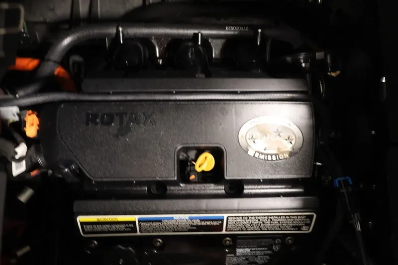 Slide: The Image of 2022 Sea-Doo Switch Sport 21 engine, featuring Rotax technology and emission label. - 38