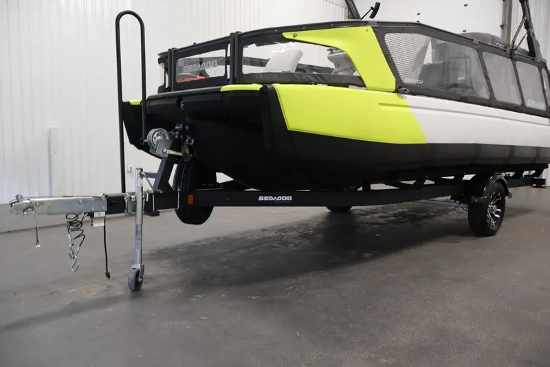 Slide: The Image of 2022 Sea-Doo Switch Sport 21 on trailer in indoor setting. - 42