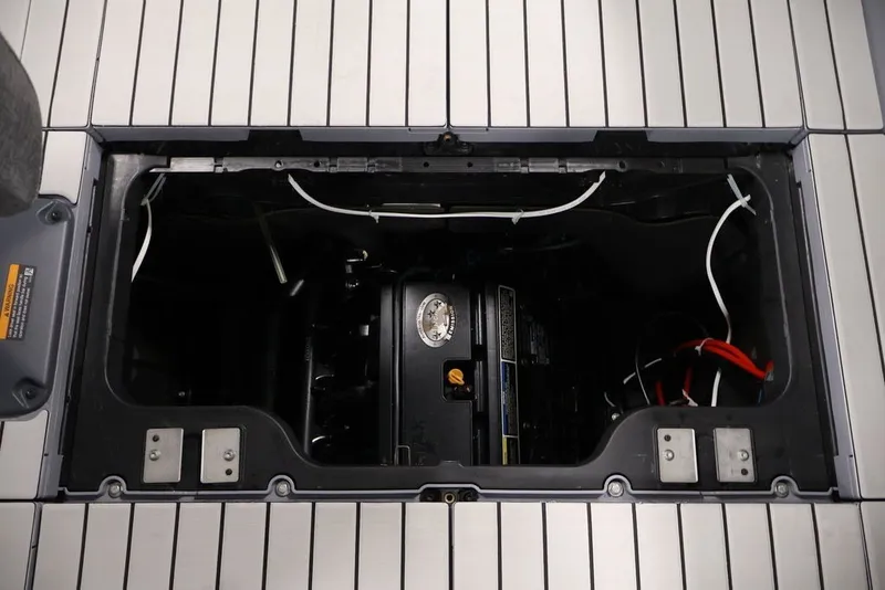 Slide: The Image of Engine compartment of 2022 Sea-Doo Switch Sport 21, showcasing internal components and wiring. - 30