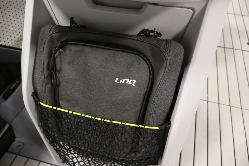 Slide: The Image of Storage compartment with LinQ bag in 2022 Sea-Doo Switch Sport 21. - 18