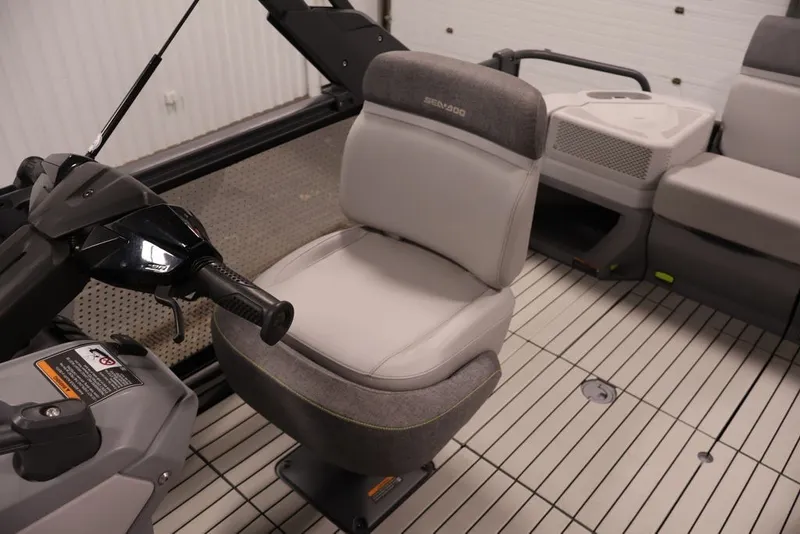 Slide: The Image of 2022 Sea-Doo Switch Sport 21 interior with steering and seating details. - 27