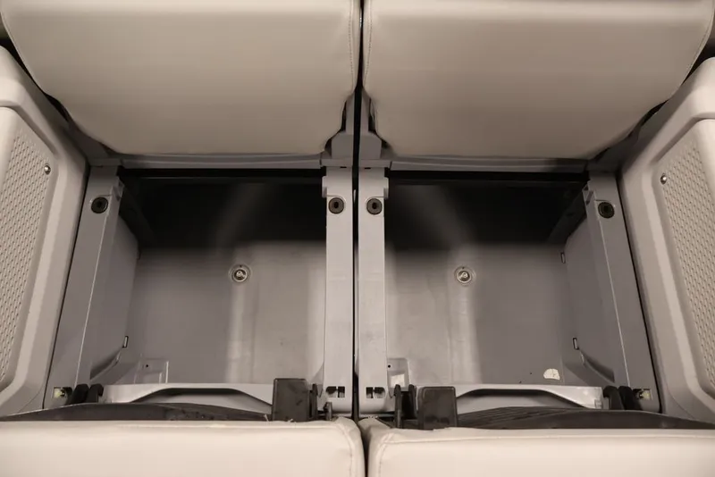 Slide: The Image of 2022 Sea-Doo Switch Sport 21 storage compartment with open seating area. - 33