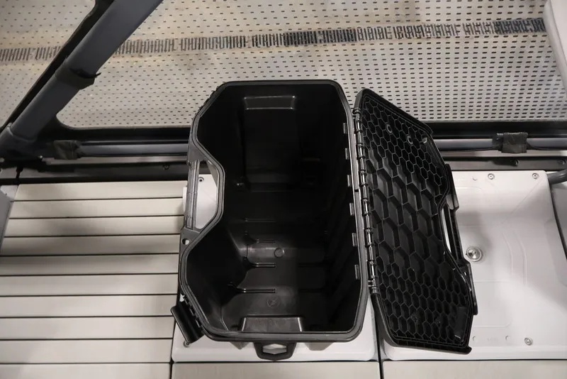 Slide: The Image of Open storage compartment on 2022 Sea-Doo Switch Sport 21 watercraft. - 15