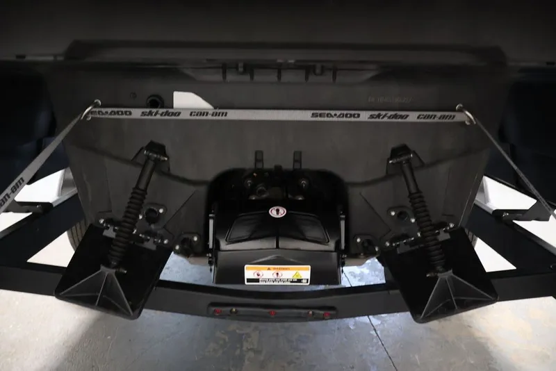 Slide: The Image of Rear view of 2022 Sea-Doo Switch Sport 21, showcasing suspension and mechanical components. - 36