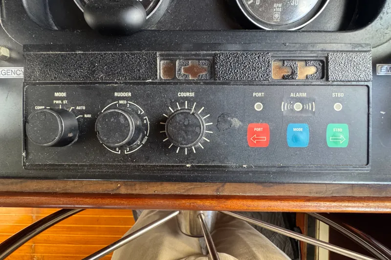 Slide: The Image of Control panel of a 1989 Ocean Yachts 48 Motor Yacht with navigation dials and indicators. - 80