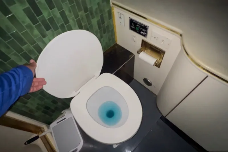 Slide: The Image of Toilet in 1989 Ocean Yachts 48 Motor Yacht bathroom with green tile wall. - 33