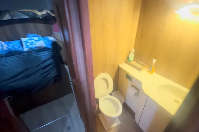 Slide: The Image of Bathroom and bedroom interior of 1989 Ocean Yachts 48 Motor Yacht. - 45