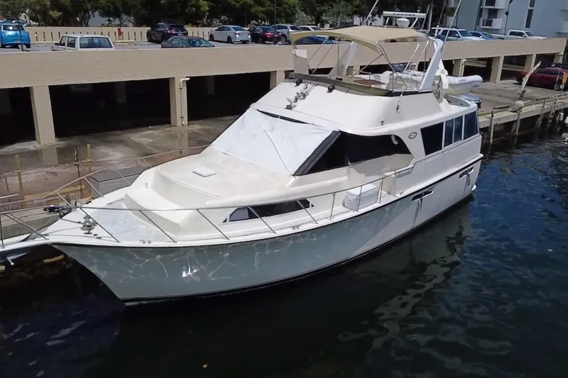 Slide: The Image of 1989 Ocean Yachts 48 Motor Yacht docked in a marina. - 126