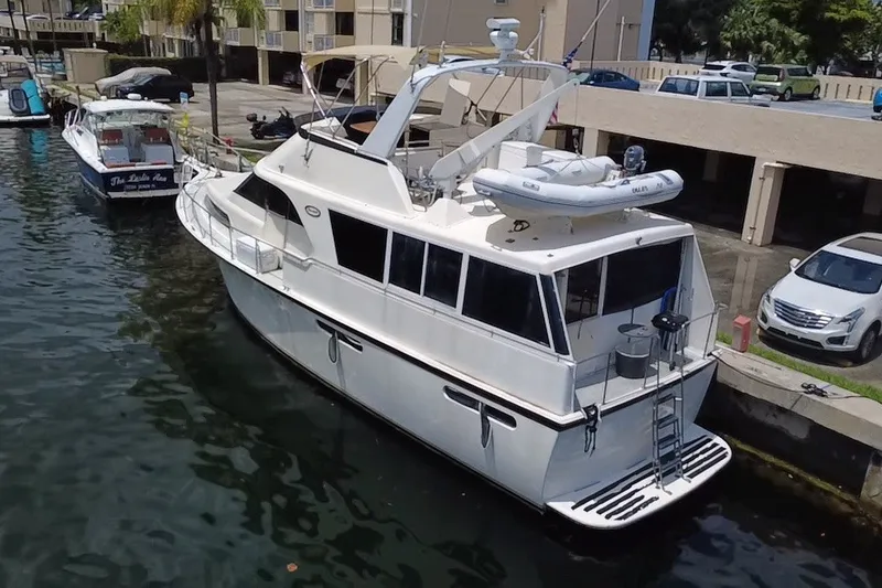 Slide: The Image of 1989 Ocean Yachts 48 Motor Yacht docked in marina, aerial view. - 122