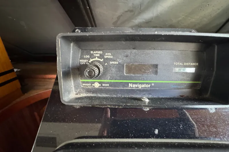 Slide: The Image of Control panel of a 1989 Ocean Yachts 48 Motor Yacht, featuring navigation settings. - 77