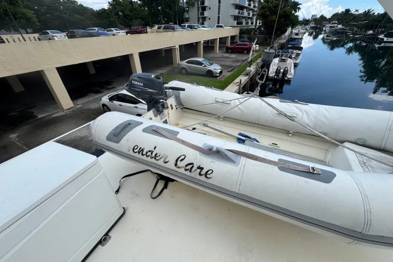 Slide: The Image of Inflatable boat with Yamaha motor on 1989 Ocean Yachts 48 Motor Yacht deck. - 111