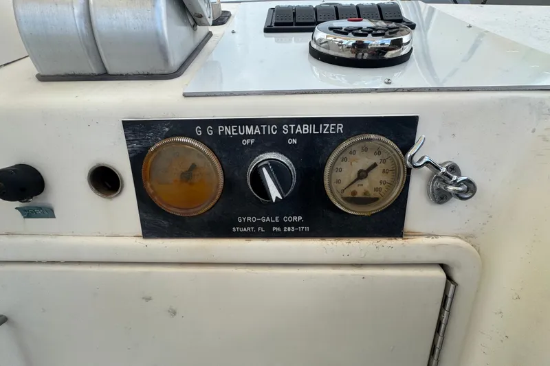 Slide: The Image of Control panel of a 1989 Ocean Yachts 48 Motor Yacht with pneumatic stabilizer gauges. - 113