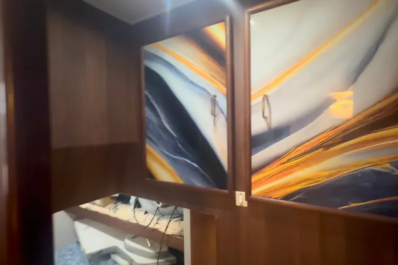 Slide: The Image of Interior of 1989 Ocean Yachts 48 Motor Yacht with abstract art panels. - 48