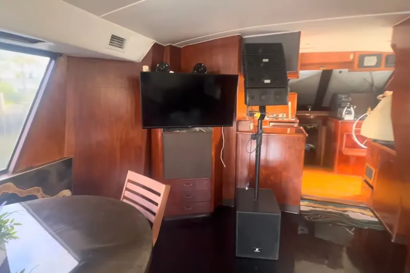 Slide: The Image of Interior of 1989 Ocean Yachts 48 Motor Yacht with TV and sound system. - 21