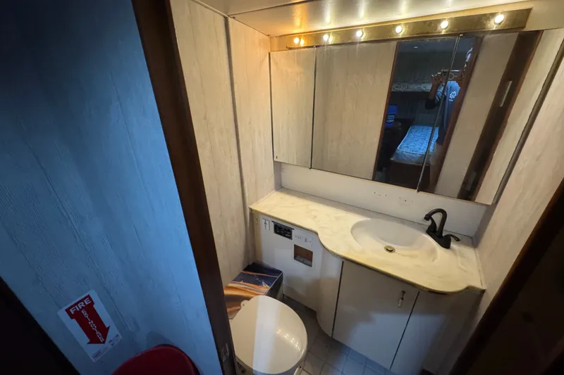 Slide: The Image of Bathroom interior of 1989 Ocean Yachts 48 Motor Yacht with vanity and mirror. - 95