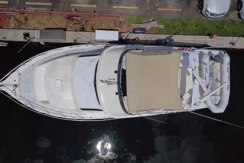 Slide: The Image of Overhead view of 1989 Ocean Yachts 48 Motor Yacht docked at marina. - 120