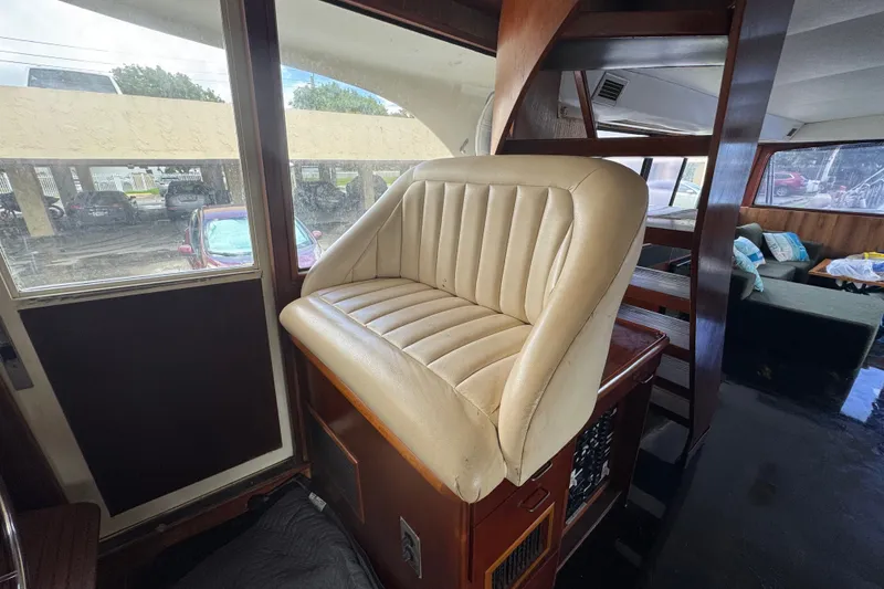 Slide: The Image of Interior of 1989 Ocean Yachts 48 Motor Yacht with beige leather seating. - 85