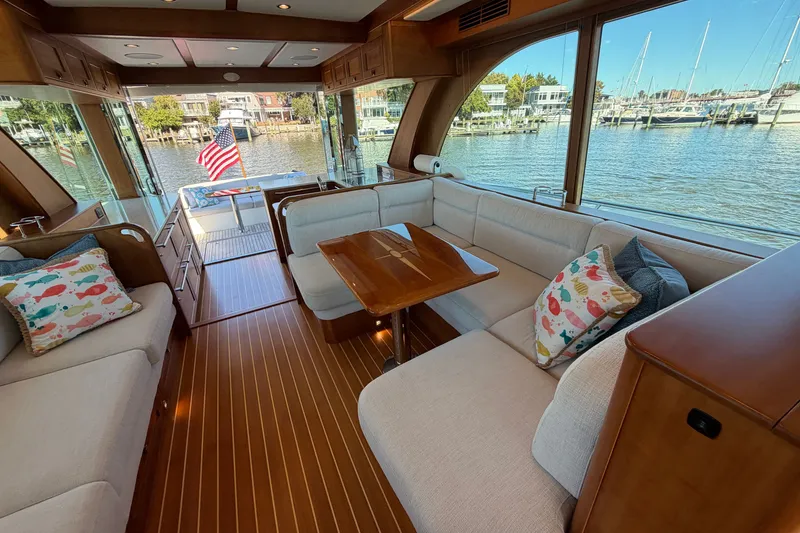 Slide: The Image of Luxurious interior of 2020 Sabre 58 Salon Express yacht with waterfront view. - 12