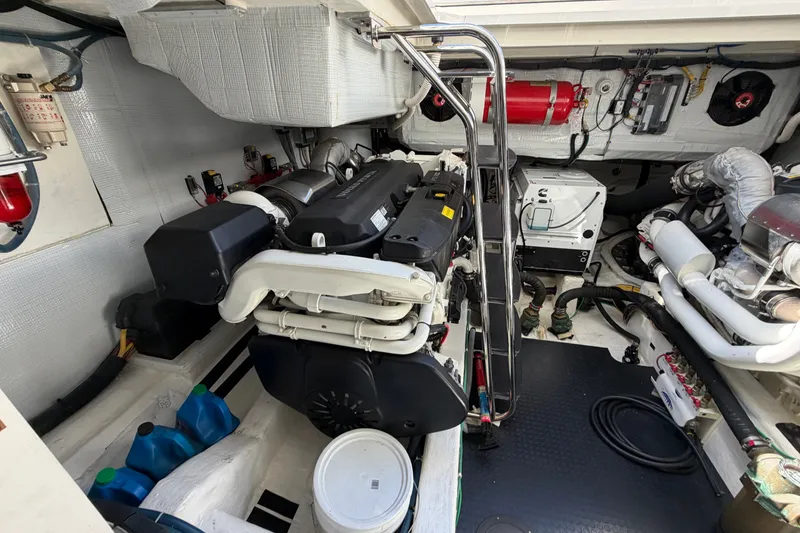 Slide: The Image of Engine room of 2020 Sabre 58 Salon Express yacht, showcasing mechanical components and equipment. - 52