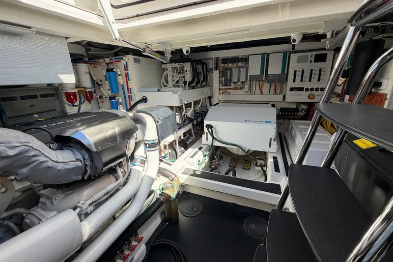 Slide: The Image of Engine room of 2020 Sabre 58 Salon Express yacht, showcasing advanced machinery and equipment. - 48