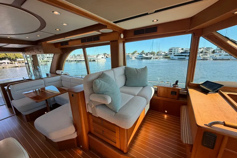 Slide: The Image of Luxurious interior of 2020 Sabre 58 Salon Express yacht with waterfront view. - 13