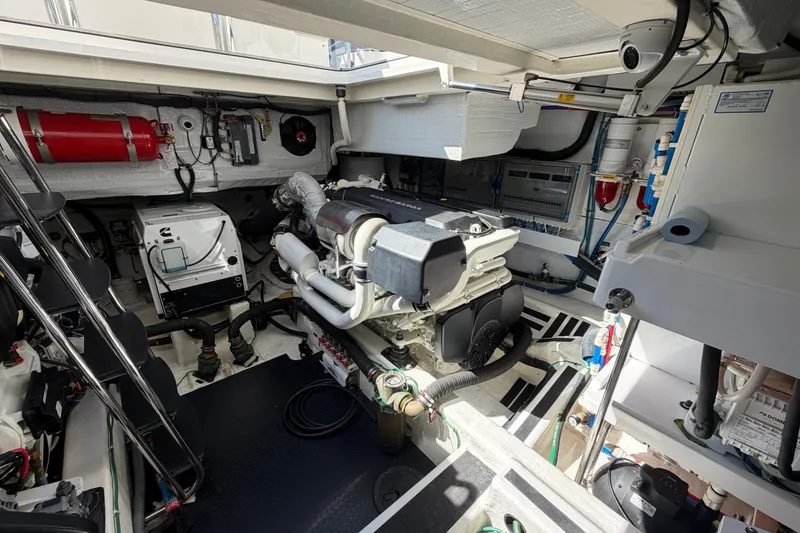 Slide: The Image of Engine room of 2020 Sabre 58 Salon Express yacht, showcasing machinery and equipment. - 51