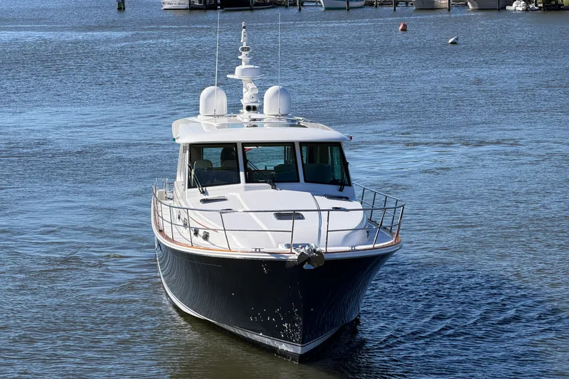 Slide: The Image of 2020 Sabre 58 Salon Express yacht cruising on calm waters. - 42