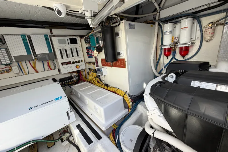 Slide: The Image of Engine room of 2020 Sabre 58 Salon Express with Seakeeper 16 and Volvo Penta components. - 50