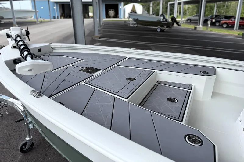 Slide: The Image of 2027 Avid 23 Mag boat with sleek deck design and modern features. - 4