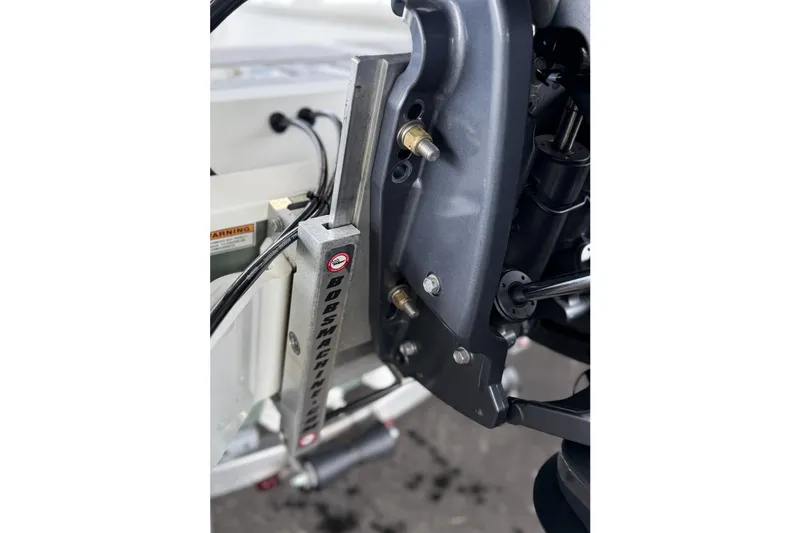 Slide: The Image of Close-up of Avid 23 Mag 2027 boat engine components and hydraulic system. - 17