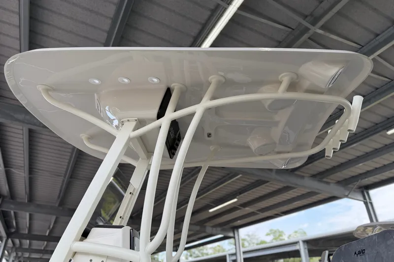 Slide: The Image of Avid 23 Mag 2027 boat canopy under a metal roof structure. - 7