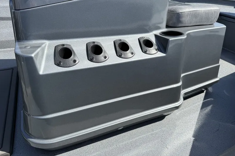 Slide: The Image of 2027 Excel 203 Bay Pro Elite boat console with rod holders and seating. - 21