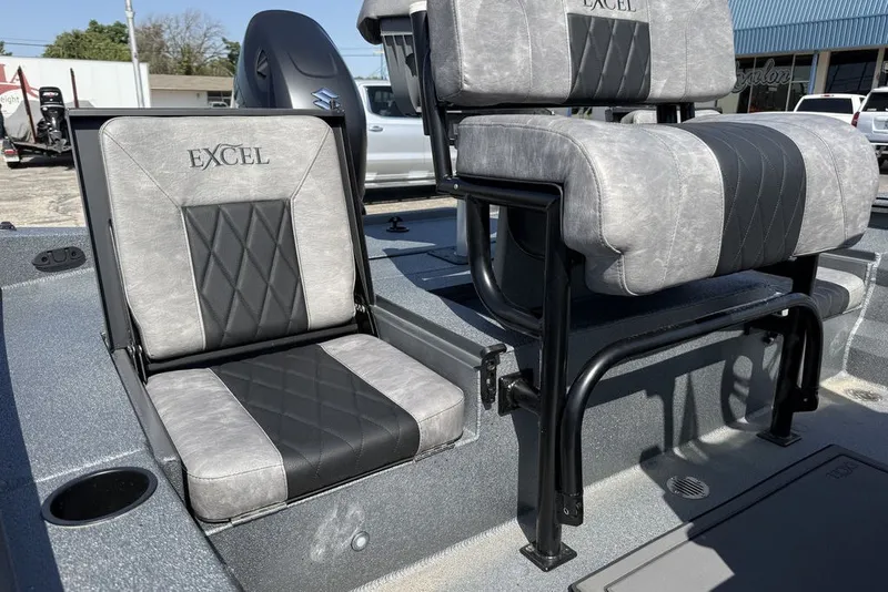 Slide: The Image of Excel 203 Bay Pro Elite 2027 boat seats with gray and black upholstery. - 19