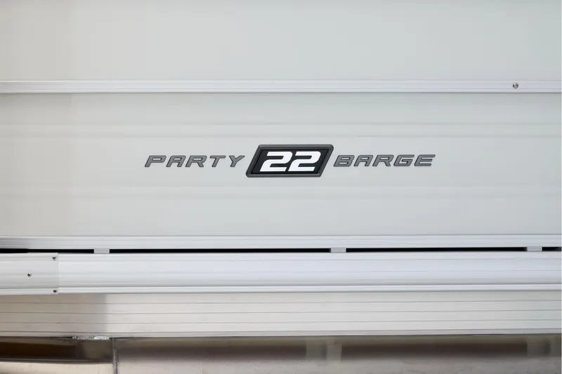 Slide: The Image of Manufacturer Provided Image: 2026 Sun Tracker Party Barge 22 XP3 logo on boat exterior. - 78