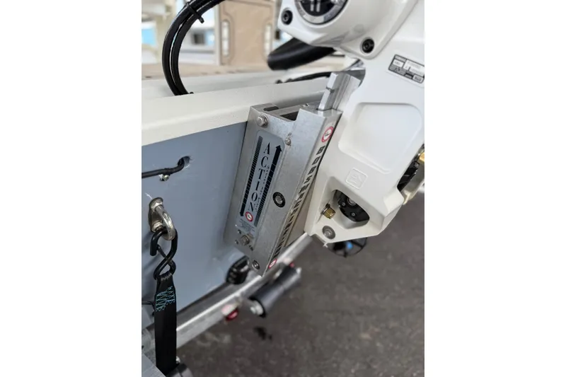 Slide: The Image of Close-up of Avid 22 Recon 2027 boat motor mount with Action branding. - 14