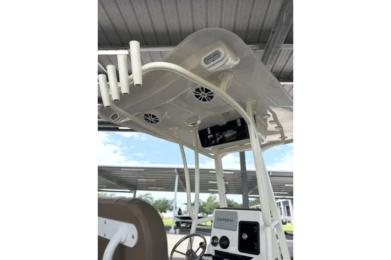 Slide: The Image of T-top of 2027 Avid 22 Recon boat with rod holders and speakers. - 19
