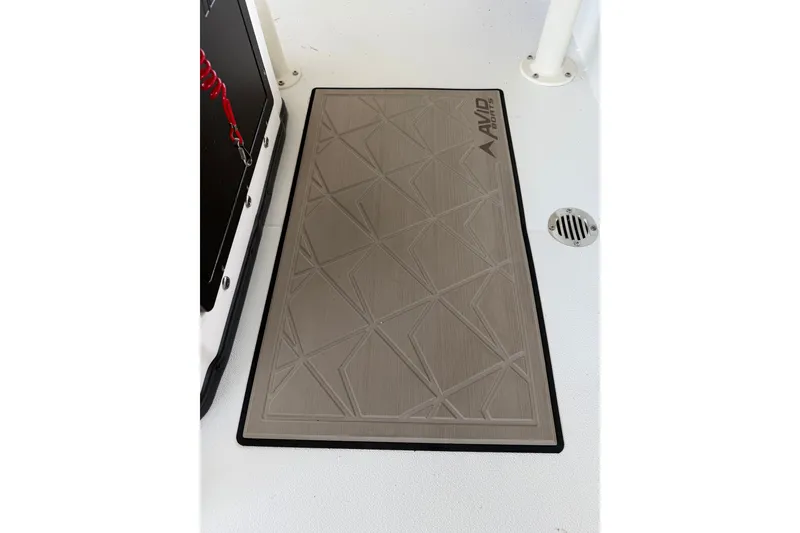 Slide: The Image of Non-slip mat on Avid 22 Recon 2027 boat deck with geometric pattern. - 23