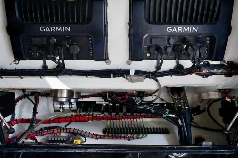 Slide: The Image of Electrical system of a 2018 Renegade 33 Open boat with Garmin equipment. - 42