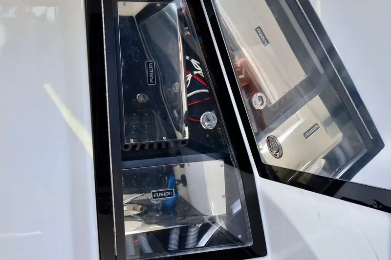 Slide: The Image of Close-up of Fusion audio equipment on a 2018 Renegade 33 Open boat. - 43