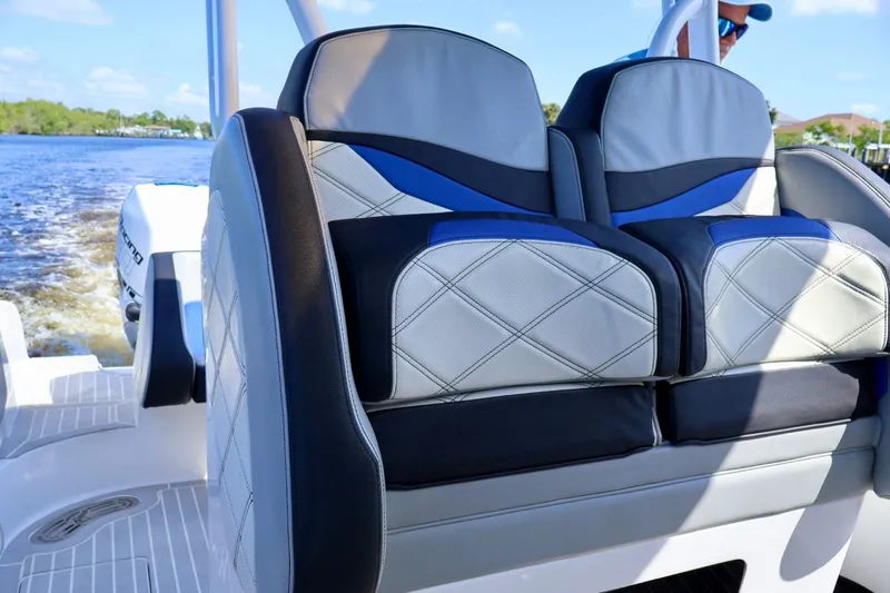 Slide: The Image of 2018 Renegade 33 Open boat seats with stylish blue and gray upholstery. - 41