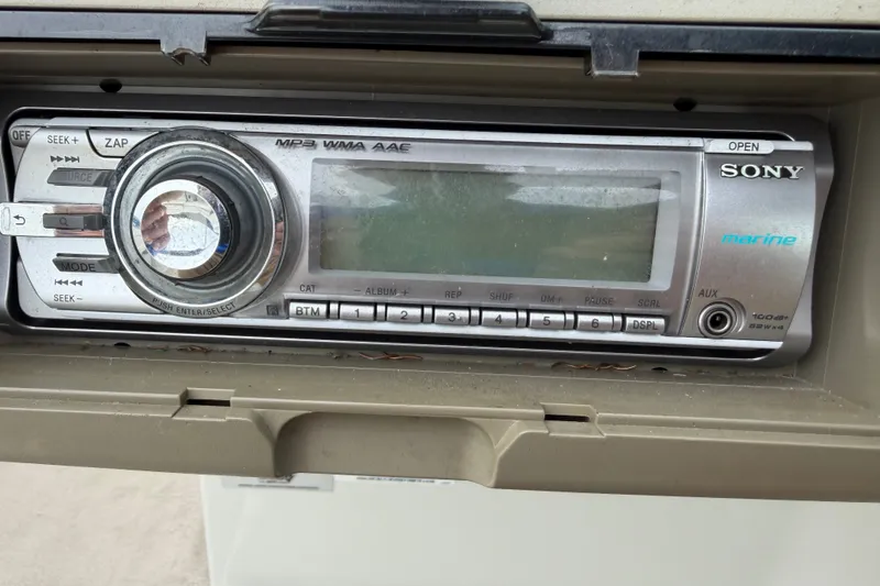 Slide: The Image of Sony marine stereo system in a 2007 Crownline 240 EX boat dashboard. - 22