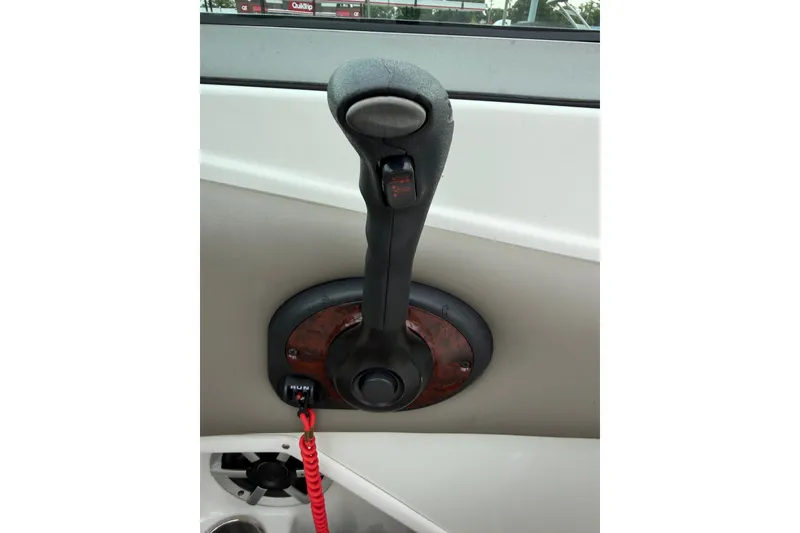 Slide: The Image of Throttle control lever on a 2007 Crownline 240 EX boat. - 23