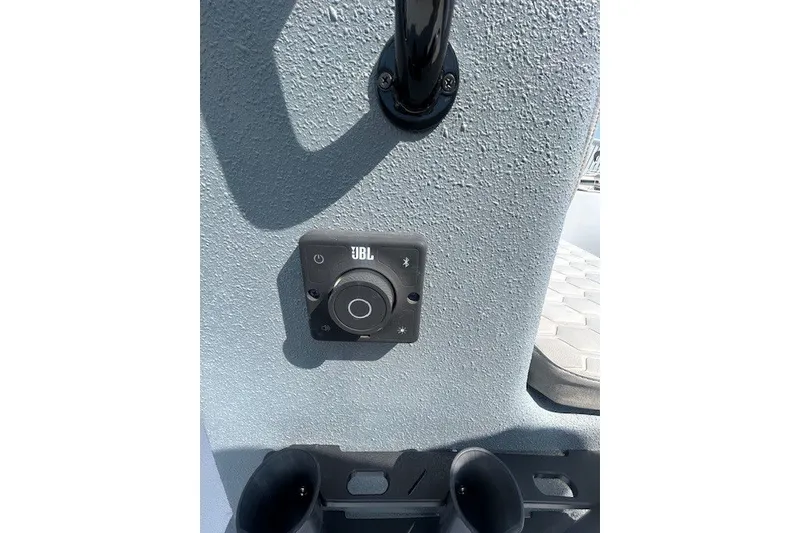 Slide: The Image of Control panel on 2025 Carolina Skiff EV218 Sea Skiff with JBL audio system. - 9