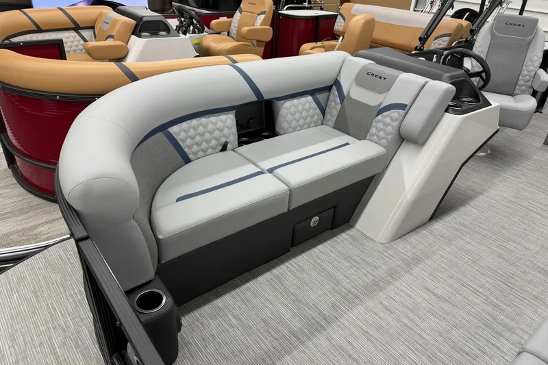 Slide: The Image of 2027 Crest Conquest 230 SLSC boat interior with luxurious seating and modern design. - 2