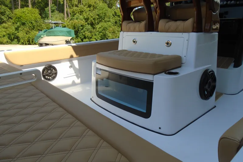 Slide: The Image of Luxurious interior of 2027 STRIKING BOATS 26XB with tan seating and modern amenities. - 15