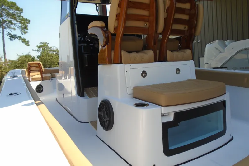 Slide: The Image of Luxury interior of 2027 STRIKING BOATS 26XB, featuring plush seating and modern design elements. - 16