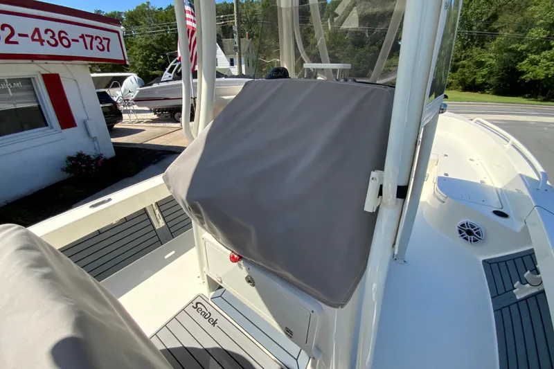 Slide: The Image of 2025 Pathfinder 2600 TRS boat interior with covered console and sleek deck design. - 40